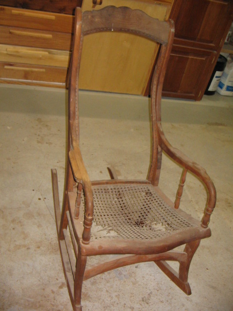 Early 1900 cherry cained rocking chair